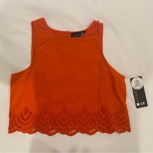 Orange Sleeveless Top with back buttons. BRAND NEW W TAG. size small